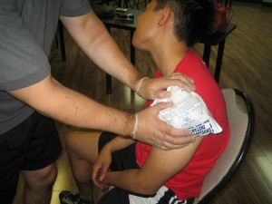 Icing a sprained shoulder in First Aid Classes in Toronto